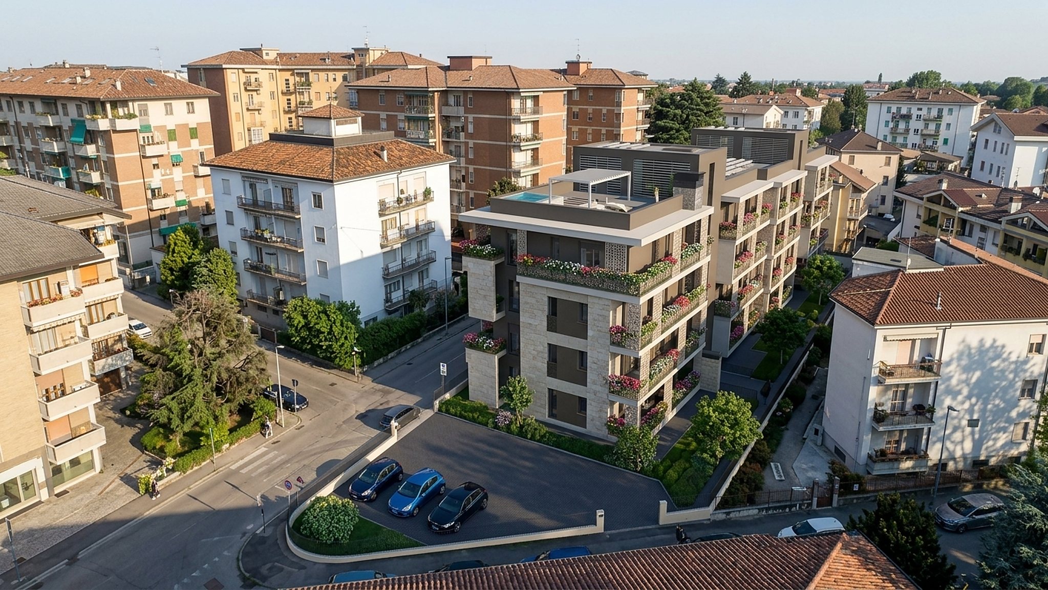 Vista aerea al tramonto della Residenza Doria 13 tra gli edifici del quartiere